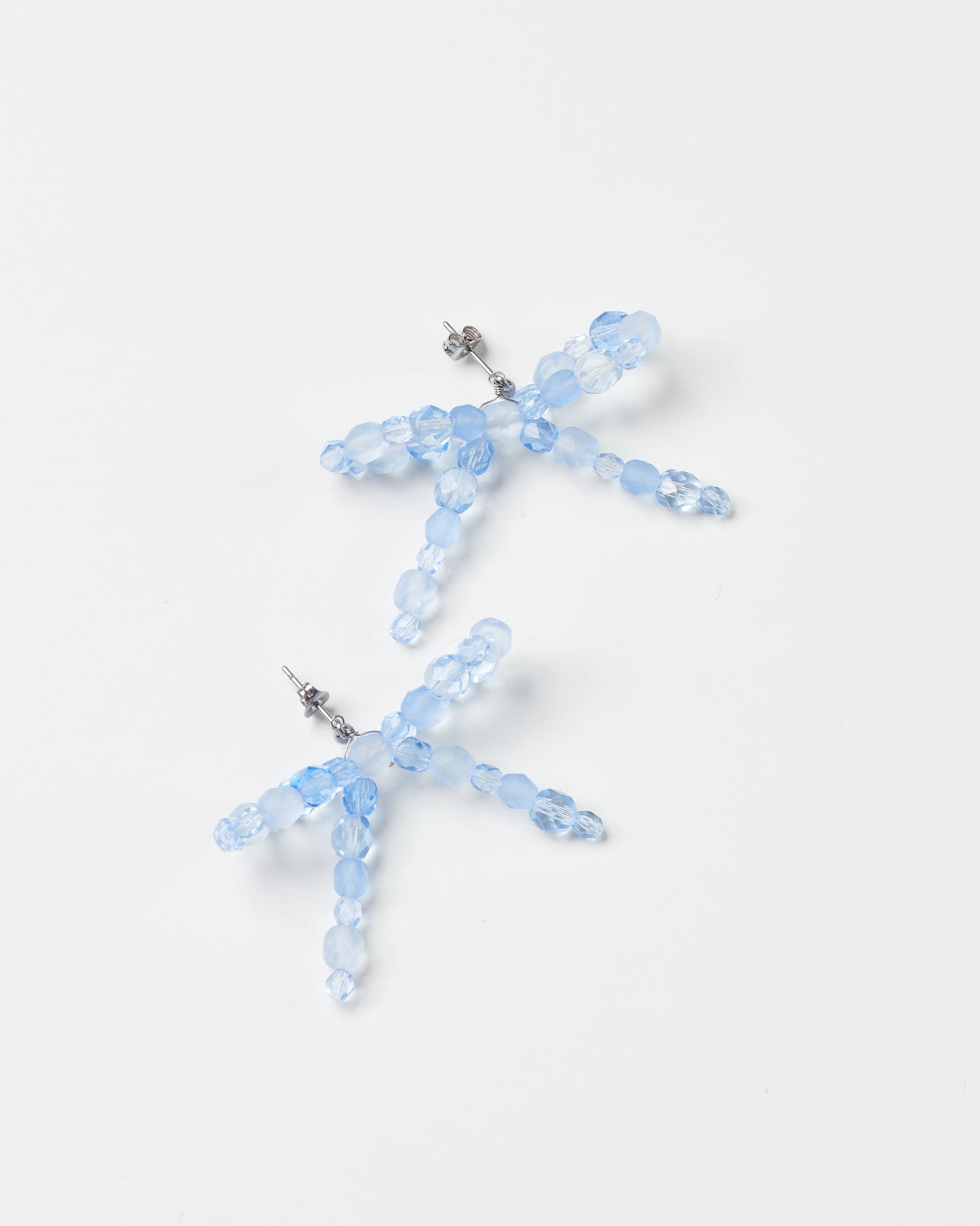 Bow earrings - medium artisanal blue